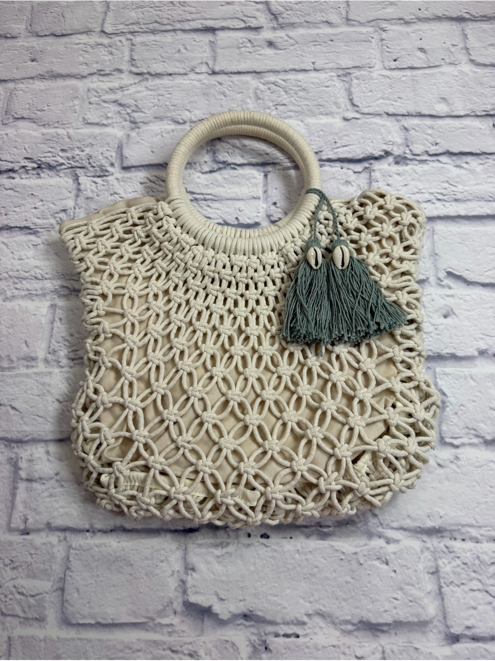 a new day Cream Macramรฉ Tote with Sage Tassel Charm